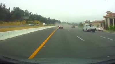 Pickup truck obliterates sedan on highway