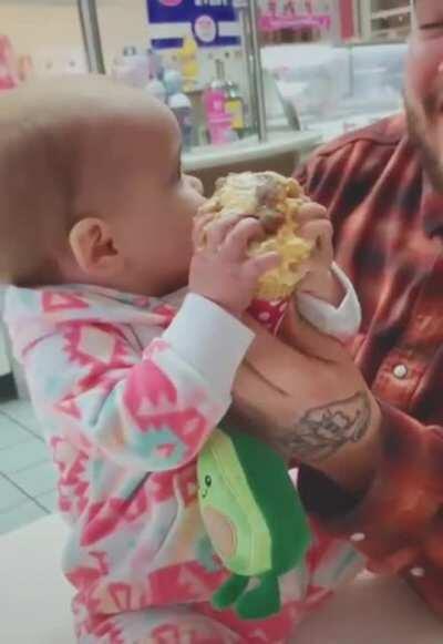 Babies first taste of ice cream.