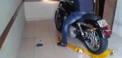 Motorcycle dolly for confined spaces.