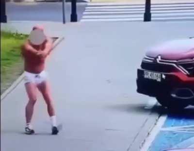 Dancing with axe in front of police officers