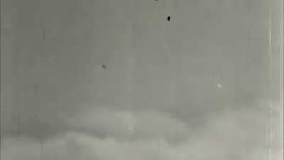 US Navy Curtiss SB2C Helldiver goes down off the Philippines after being struck by ground fire circa late 1944