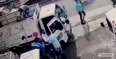 Guy on truck has a great aim to Robber!
