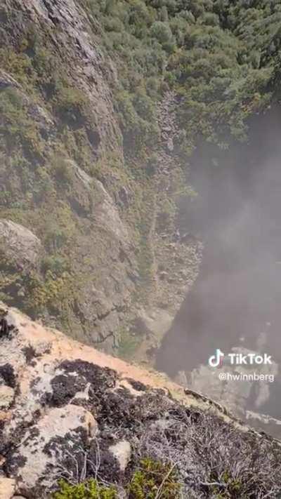 Norwegian safety worker removes a loose boulder
