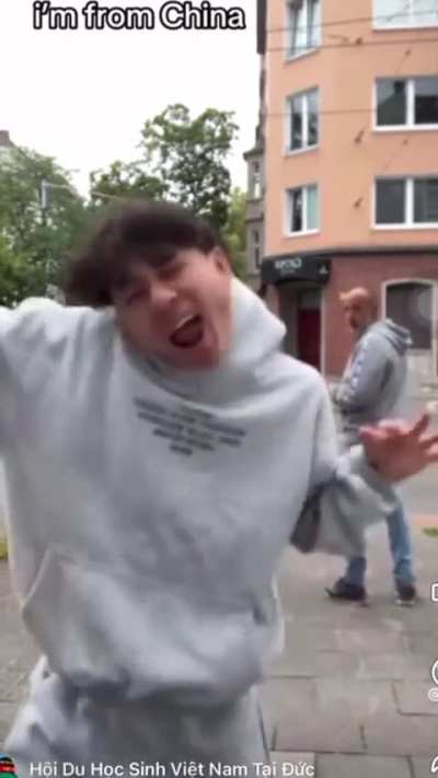 Man mocking a disabled children