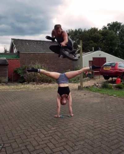 Extreme unicyclist meets pro acrobat