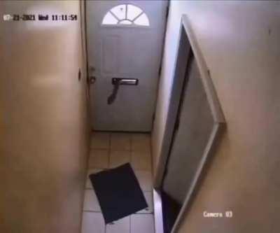 To open someone's door by sticking their hand inside the the mail slot.