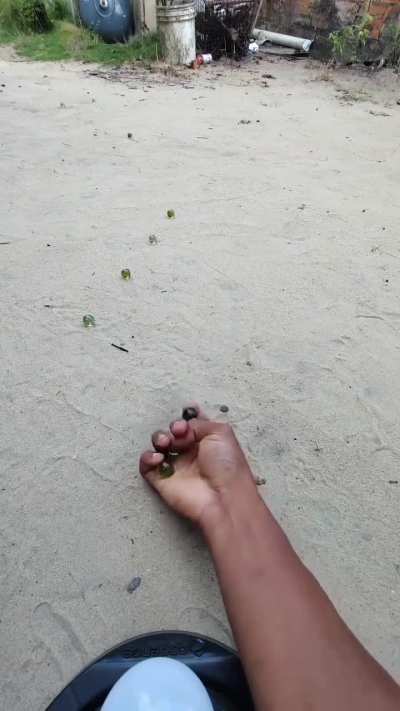Shooting marbles