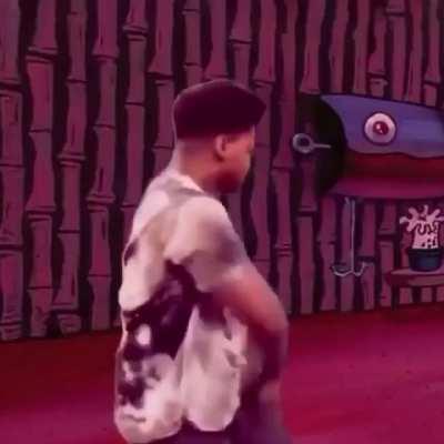 paul pogba in the man u dressing room celebrating a 1-1 draw