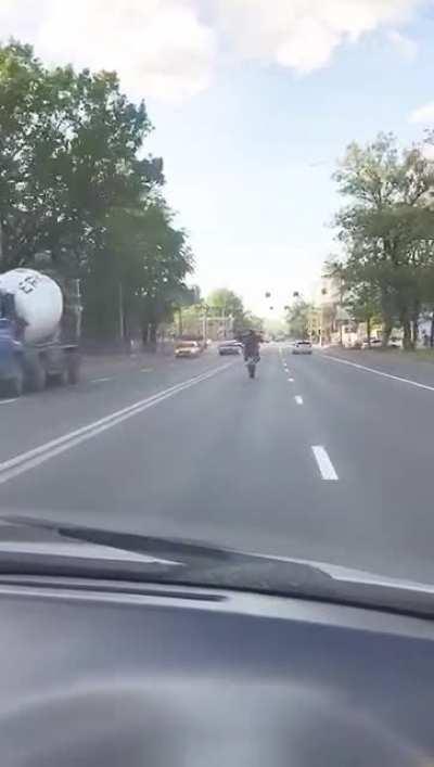 This dude was just asking for it doing this in traffic