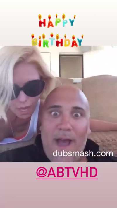 Kelly licks her friend's bald head!