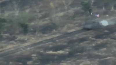 Russian vehicle with Russian and USA flags is getting damage during the assault on Ukrainian positions in Zaporizhya region