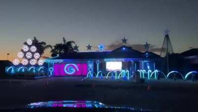 Bluey Christmas lights/concert outside someone's house.
