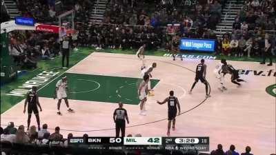 [Highlight] Kyrie steps back and has Jrue Holiday looking foolish, before selling his own clip with a brick