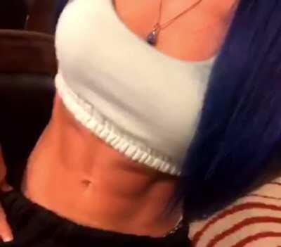 Sasha showing off her abs