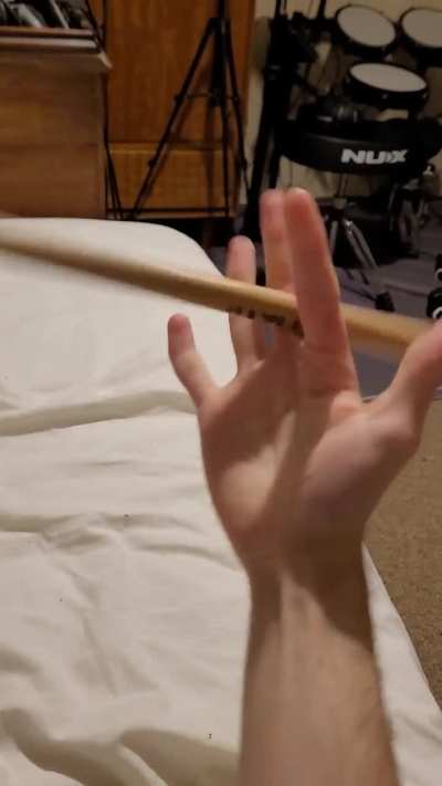 How to stop drumsticks 'climbing' my fingers when twirling?