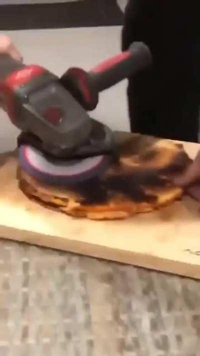 removing the burnt part of a pizza