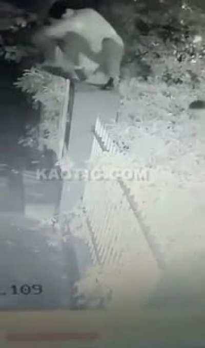 Climbing over a fence