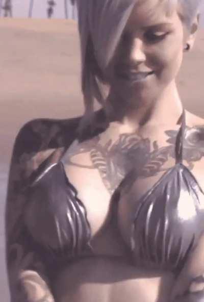 Sara X Mills flexing on beach