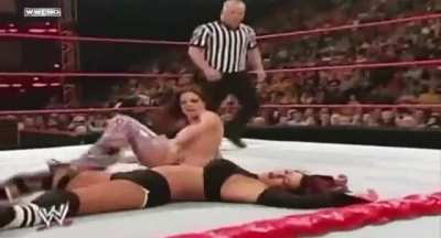 Candice flattens Victoria with a nice spinning heel kick