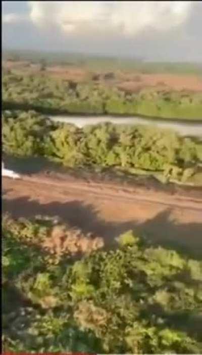 Drug traffickers' jet escaping a military helicopter in Jalisco, Mexico.