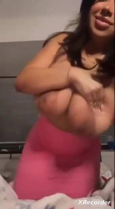 Thick Asian playing with her titties