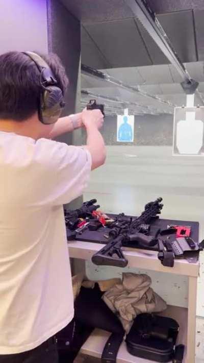 Spent casing bounces off wall and hits primer on table.