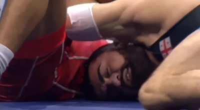 Today in World championship. Wrestler was losing then he tries to choke out his opponent at the last seconds
