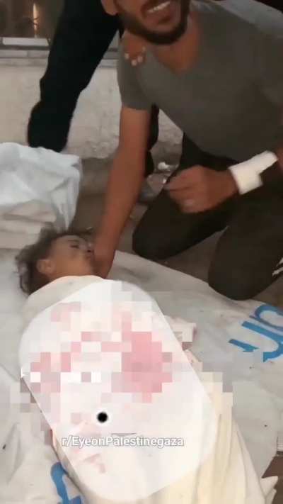 In a heart-wrenching scene, a father is left devastated by the loss of his only daughter, the child his wife gave birth to after 17 long years of waiting and hope. His little girl, the light of his life, was taken from him by an Israeli missile that struc