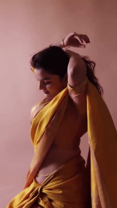 Anveshi Jain in a yellow traditional attire
