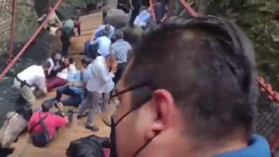 Suspension bridge falls during reopening in Cuernavaca, Mexico.