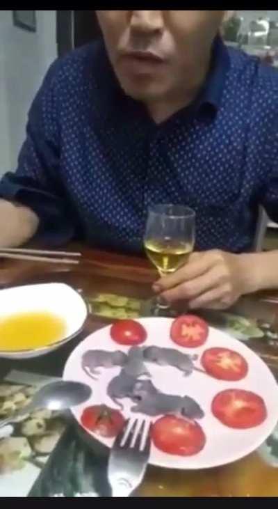 Just a man enjoying a succulent Chinese meal