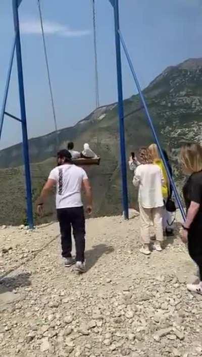 to ride this obviously dangerous ride without any safety harness what could possibly go wrong