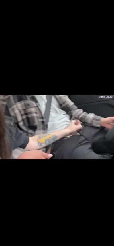 Lesbian giving her friend a handjob in a car