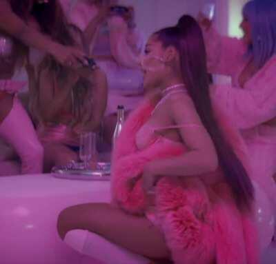 Ariana Grande twerking with her tongue out