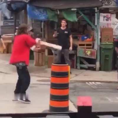 Man tries to pick a fight and then drops his weapon