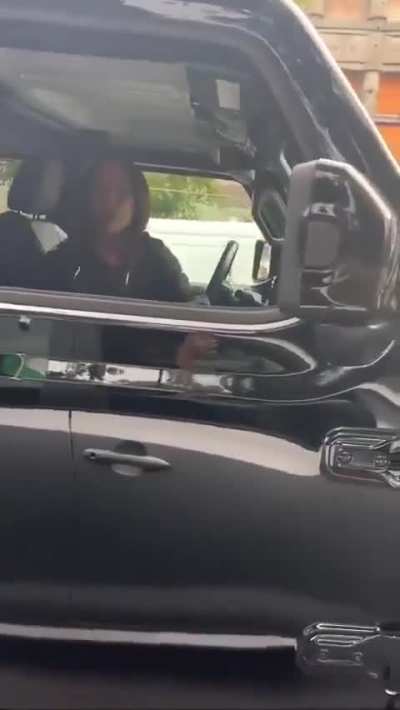 A woman yells, 'You should be r*ped and dragged through the streets in front of your kids,' at someone for having a Palestinian flag on their car.