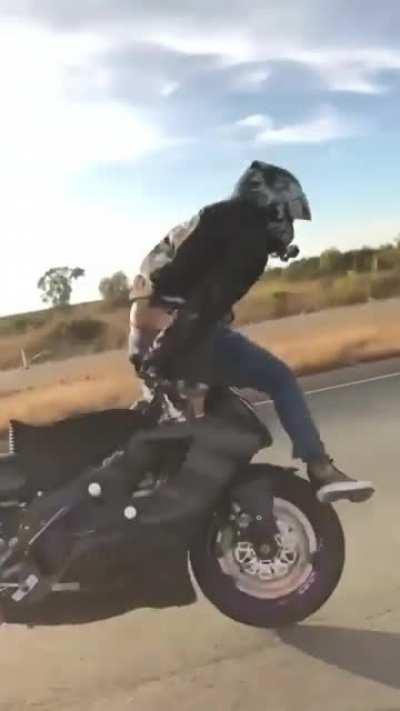 Reckless driver falling off his motorcycle