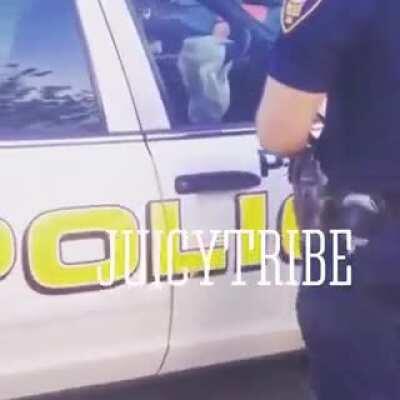 Cop hits parked car,locals go loco.