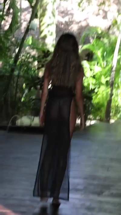 Titillating Liza in see-thru maxi dress