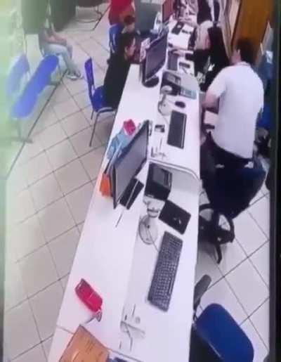 Office chair launches top half after man gets up. Date unknown