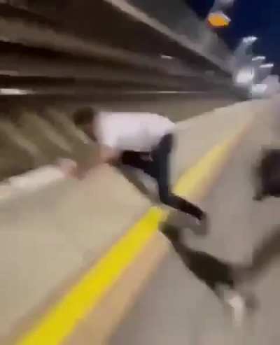 Drunk guy yelling racial slurs at teens falls on tracks somehow lives!