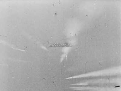 Luftwaffe Bf 109 F pilot displays very little concern for ammunition economy while dogfighting with RAF Hurricanes over France in 1942