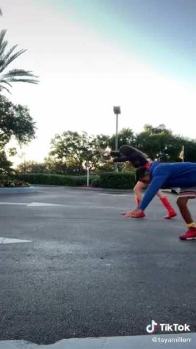 Supergirl handstands and cartwheels