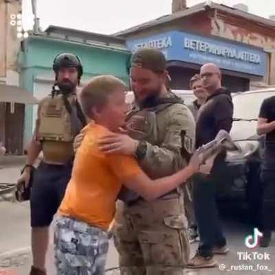 Young lad from Oleshky gets to meet a real hero, the soldier of the AFU that delivered water to him and his family by drone when they were trapped by the flooding