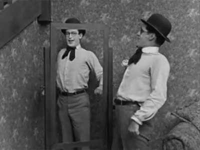 Harold Lloyd pretending to be a reflection in The Marathon (1919) [xpost r/silentmoviegifs]