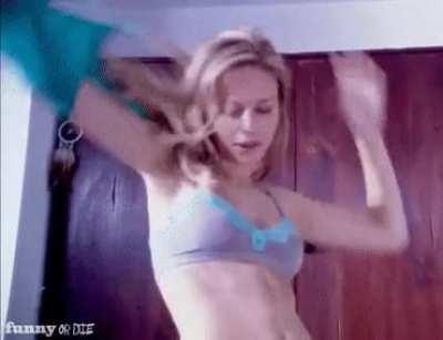 Brie taking her shirt off