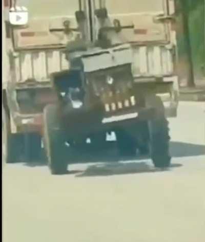 A happy trailer rolling down the highway.