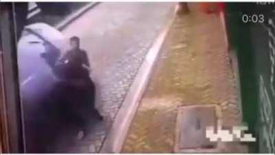 Car loses control, close call with pedestrians