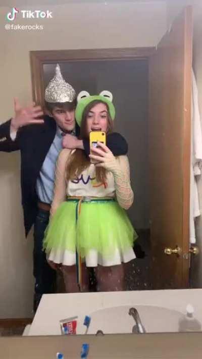 Perfect couple costume: Alex Jones and a gay frog