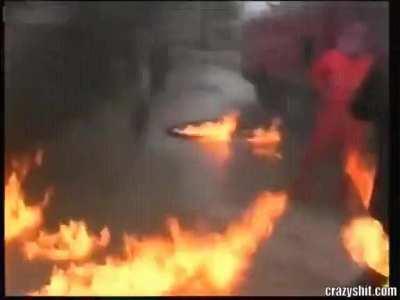 Fire Fighters fighting with fire